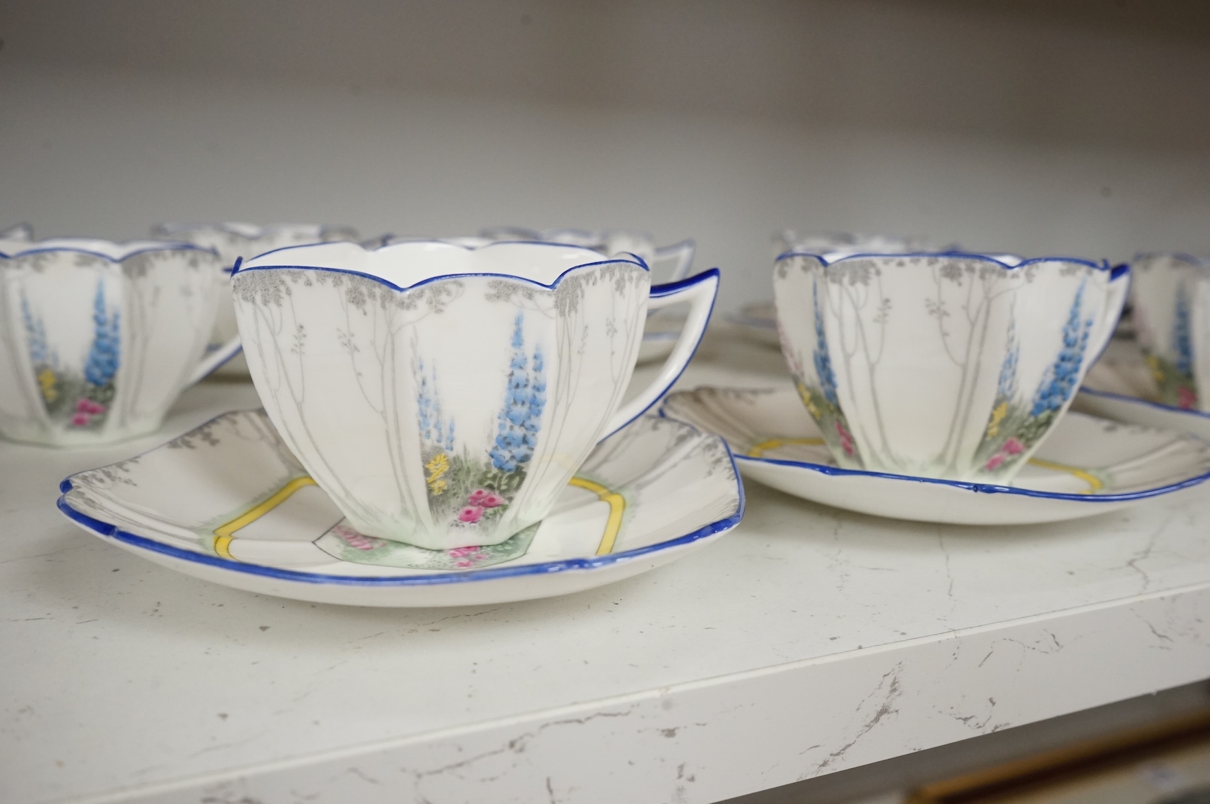 An Art Deco Shelley ‘My Garden’ part teaset to include cups, saucers, jugs and sandwich plates